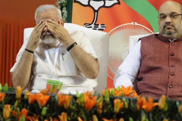 modi-sad-with-amit-shah-getty