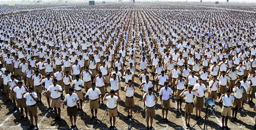 Rashtriya Swayamsevek Sangh (RSS) or the National Volunteers Corps, workers participate in a convention in Indore, India, Sunday, Jan. 6, 2013. Hardline Hindu organization RSS is the parent organization of Indias main opposition Bharatiya Janata Party. (AP Photo)