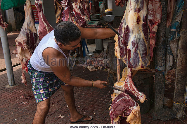 butcher-at-work-in-the-meat-market